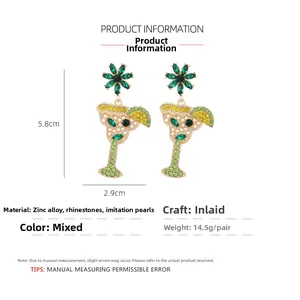 Cocktail cup earrings with green crystals, pearls and size specs 5.8cm by 2.9cm