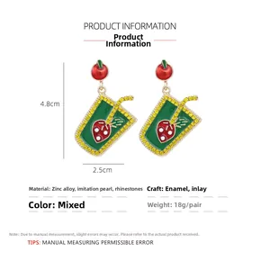 Detail view of strawberry drink earrings showing height 4.8cm and width 2.5cm dimensions