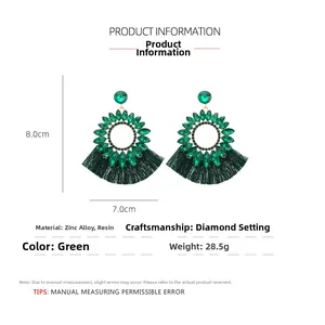 Detail view of Bohemian dark green fringe earrings with zinc alloy and resin rhinestones
