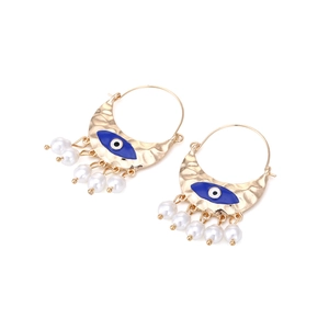 Vintage gold textured evil eye hoop earrings with blue enamel and white pearl charms