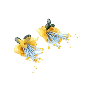 Detailed shot of handmade chiffon flower earrings with blue and yellow seed bead tassels