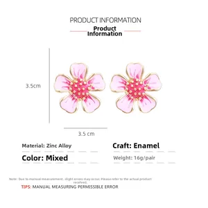 Detail view showing pink flower earrings size dimensions 3.5cm and zinc alloy material