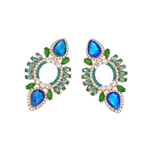 Chunky geometric drop earrings with blue pear crystals and green rhinestones in gold setting