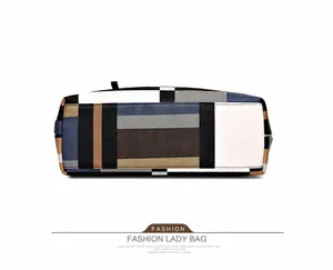 Flat rectangular bottom view of the multicolored geometric patchwork handbag