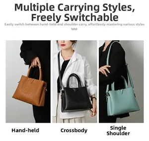 Detailed views of crocodile embossed handbags in brown, black, and light blue finishes