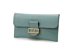 Close-up of light blue crocodile pattern wallet with elegant gold V-shaped metal buckle