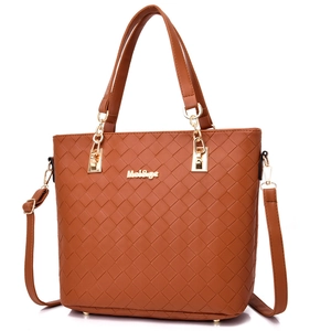 Brown woven textured tote bag with top handle and adjustable shoulder strap for women