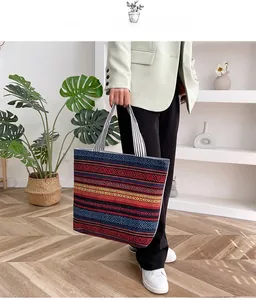 Detailed close-up of Bohemian geometric pattern on large capacity canvas tote bag with woven handles