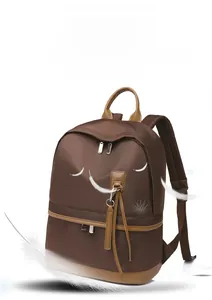 Brown lightweight backpack with nylon fabric and feathers showing its light weight
