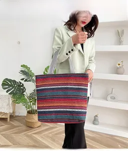 Ethnic striped canvas tote bag detail showing large capacity and colorful woven pattern