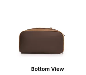 Detail view of the reinforced two-tone synthetic leather bottom of the backpack