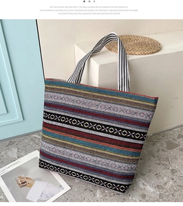 Macro view of bohemian woven pattern and striped handle on the canvas tote bag