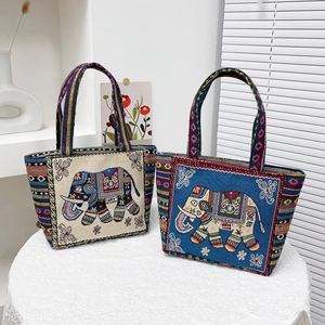 Ethnic embroidery tote bag with elephant pattern and colorful rainbow woven straps
