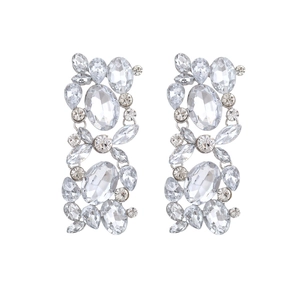 Detail of vintage flower earrings with multi-cut rhinestones and silver-tone metal