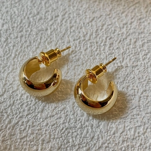 Polished 18K gold-plated C-shaped chunky hoop earrings with a sleek mirror finish