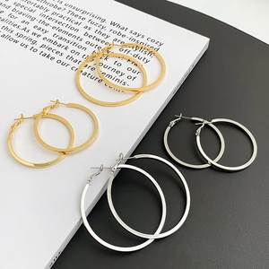Detailed comparison of gold and silver hoop earrings in large and small sizes