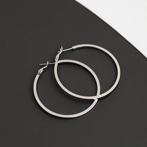 Polished silver large hoop earrings with minimalist metal design for modern women fashion