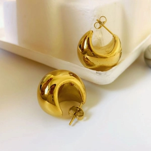 Polished 18K gold plated chunky C-shaped hoop earrings with a shiny mirror finish