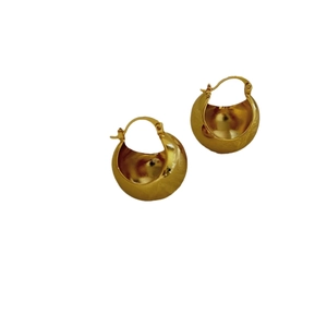 Polished 18K gold chunky round hoop earrings with a sleek minimalist elegant style