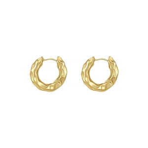 Textured gold hoop earrings with irregular hammered finish and secure buckle clasp design