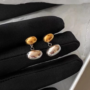 Chic 18K gold and silver two-tone bean stud earrings with high-polish mirror finish
