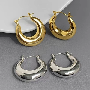 Boucles d'oreilles créoles en corne en forme de U en finition or et argent polie