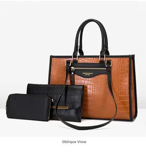Détail du lot de 3 sacs à main à motif crocodile en marron et noir contrasté