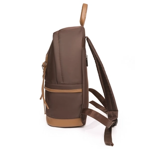 Waterproof nylon backpack in dark brown with leather accents shown from a 45-degree angle