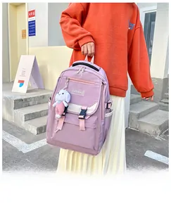 Light purple multi-pocket nylon backpack with cute white rabbit plush keychain detail