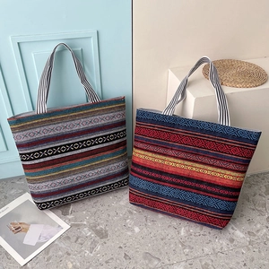 Ethnic style woven canvas tote bags with geometric patterns and striped handles for women