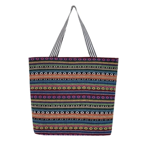 Ethnic style colorful striped canvas tote bag with geometric patterns and striped handles
