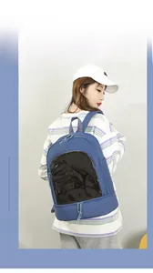 Detail view of navy blue oxford backpack featuring transparent window and bottom zip pocket