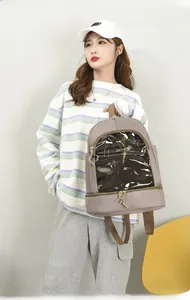 Detail view of water-resistant nylon ita bag showing transparent PVC window and 0.4KG weight