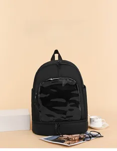 Detail view of the transparent PVC window on a black Oxford fabric backpack for badges