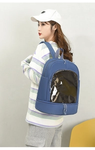 Blue Oxford backpack detail showing the transparent window and lower zipper compartment