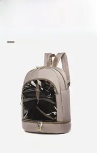 Side view of khaki oxford fabric backpack featuring a transparent PVC display window detail