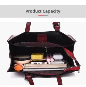 Top view showing large interior capacity of embossed wine red tote bag with daily items