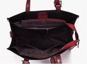Top view of spacious handbag interior with zipper compartments and brown fabric lining