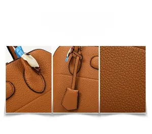 Close-up of brown tote bag with silk scarf handle, pebble leather texture and stitching