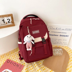 Minimalist burgundy large capacity nylon school backpack with a cute rabbit pendant accessory