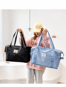 Detail of high-density water-resistant nylon fabric on fashion travel duffel bags