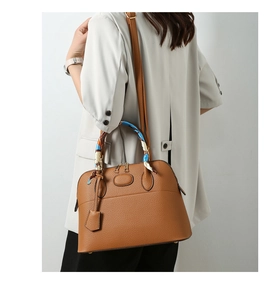 Brown lychee leather handbag with silk scarf handle and golden hardware detail
