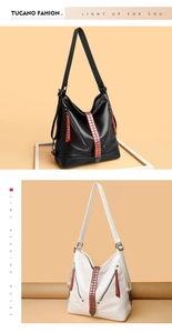 Vue détaillée des sacs cabas stylés avec rivets et bandoulières rouges en noir et blanc