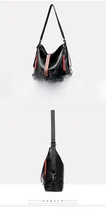 Détail du sac hobo en cuir PU noir avec fermetures éclair rouges et clous argentés