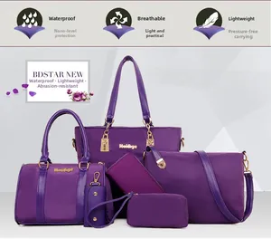 Detail of purple 6-piece nylon bag set showing waterproof tote and crossbody bags