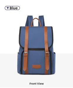 Front view of a blue lightweight nylon backpack with brown straps and metal buckles