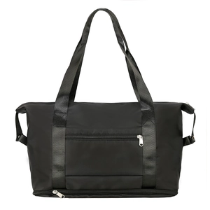 Black high-capacity travel bag with bottom shoe compartment and waterproof nylon fabric