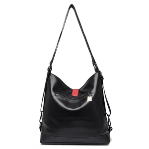 Sac à dos multifonction en cuir grainé noir avec détails rouges et finitions argentées