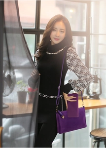 Detail of purple nylon tote set with matching wallet and golden metal chain hardware