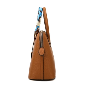 Brown litchi leather tote bag with printed silk scarf handle and silver zipper detail